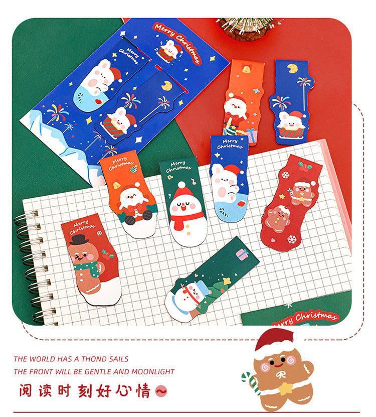 Close-up of Christmas magnetic bookmarks on a table