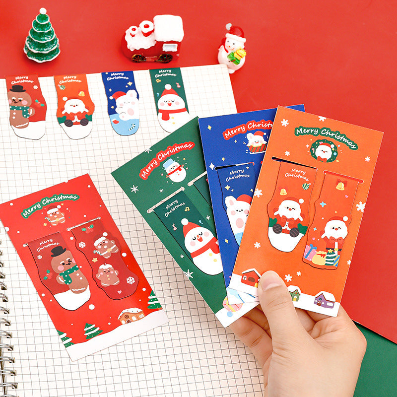 Holiday-themed magnetic bookmark showing a reindeer