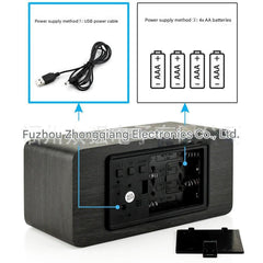 Alarm clock charging a smartphone