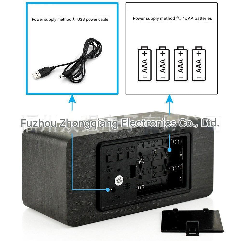 Alarm clock charging a smartphone