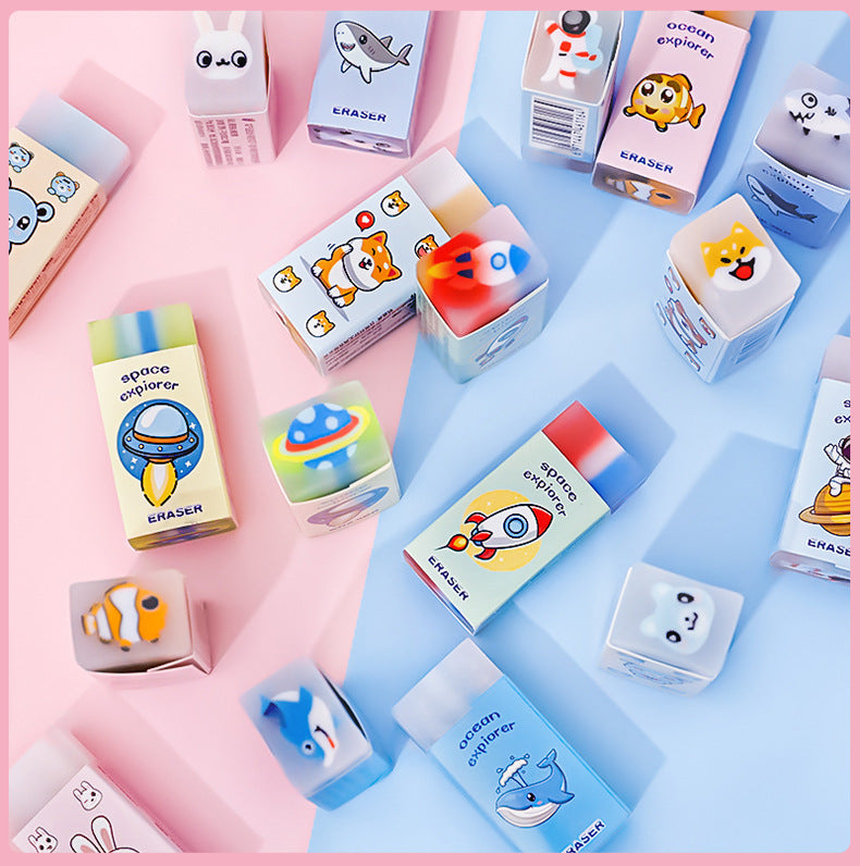 Various astronaut erasers for kids displayed