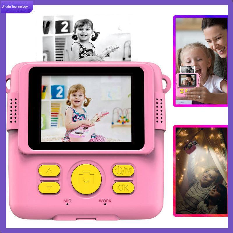 Child using camera to print photo
