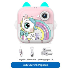 child examining photo from pink instant camera