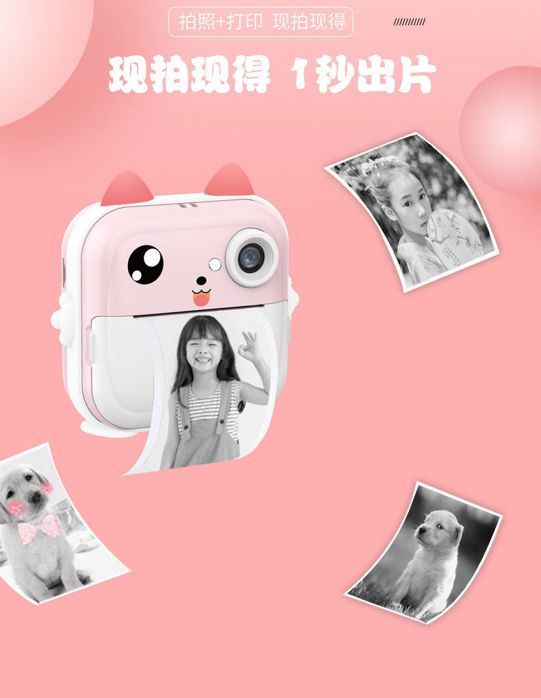 child examining photo from pink instant camera