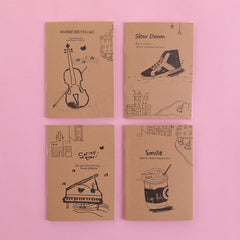 notebook surrounded by decorative leaves