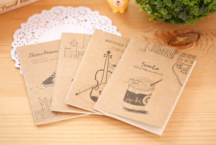 open kraft notebook with pen and notes