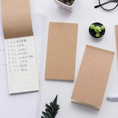 close-up of cream-coloured notepad pages