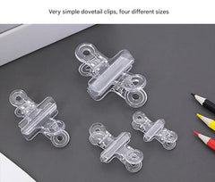 Multi-size tail clips on a table