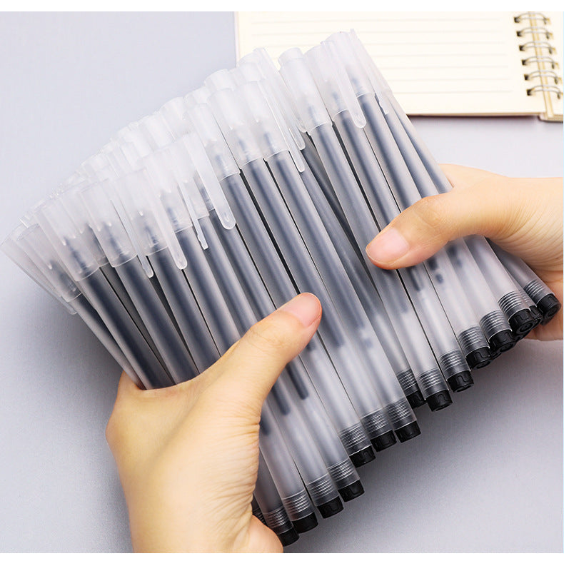 person writing notes with black gel pen for school