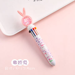 Holding the multi-color pen in hand
