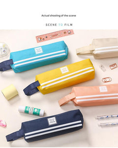 organised stationery in Oxford cloth pencil case