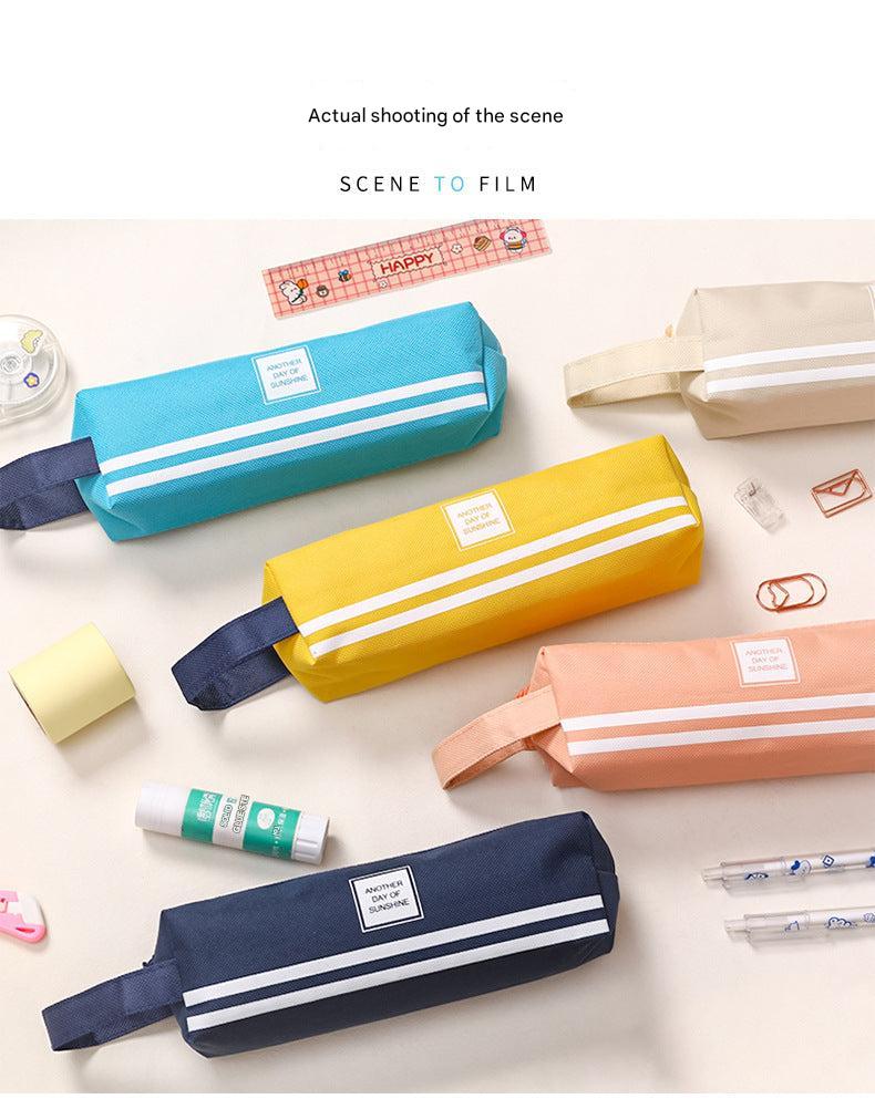 organised stationery in Oxford cloth pencil case