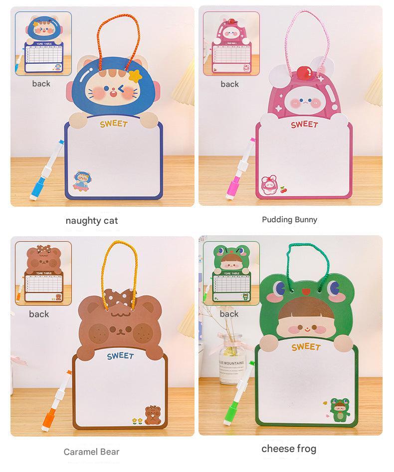 Kids drawing on double-sided erasable board