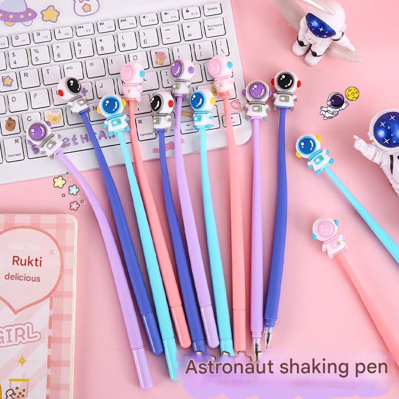 Close-up of colourful astronaut pen caps