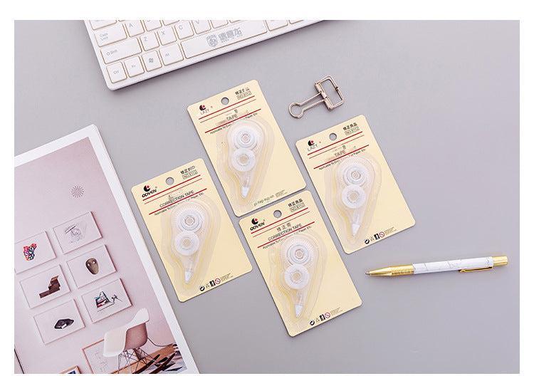 correction tape on modern desk
