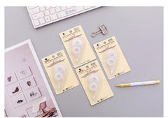 correction tape on modern desk