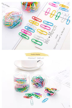 Colourful binder clips isolated on white