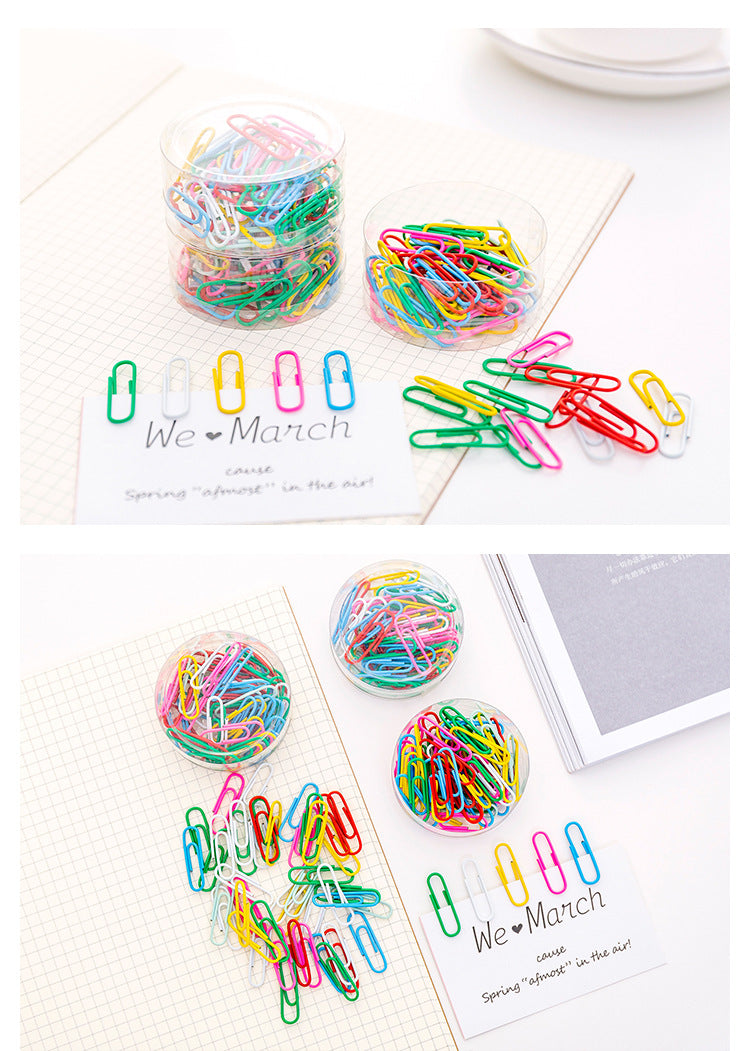 Collection of vibrant paper clips on desk