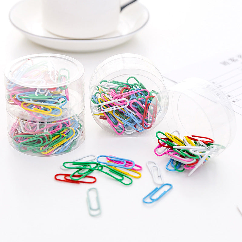 Colourful binder clips isolated on white