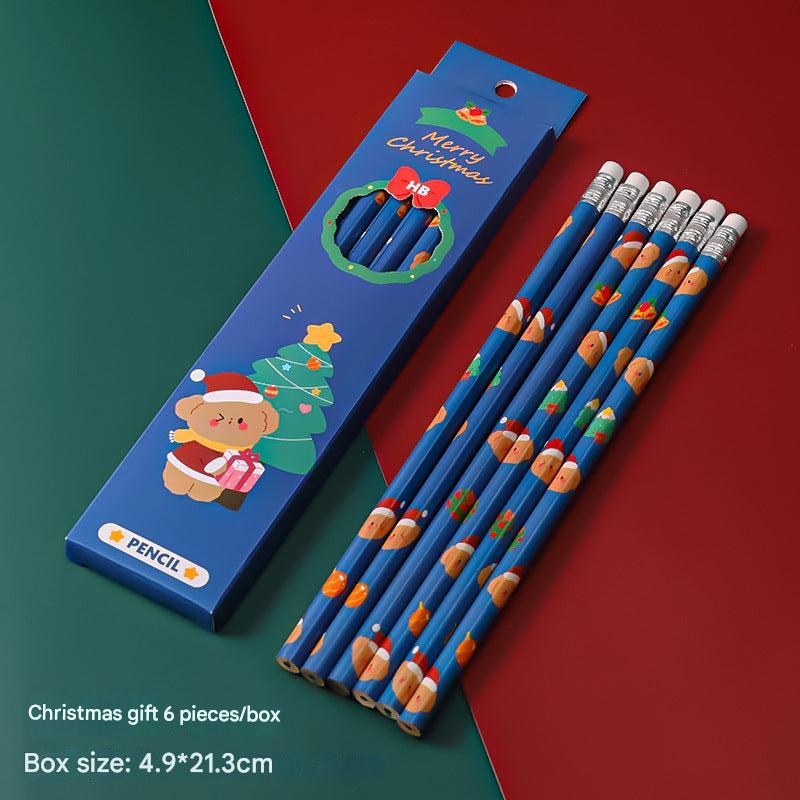 Festive gift box containing children's art pencils