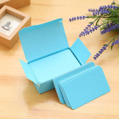 Close-up of vibrant note cards in assorted colours
