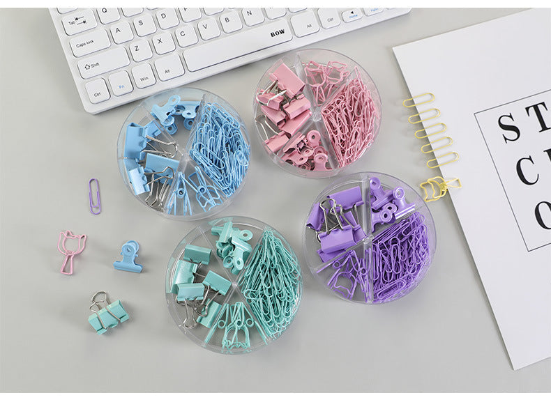 Organised desk with colourful binder clips
