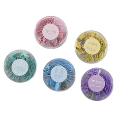 Metal binder clips in various colours arranged