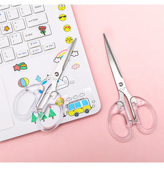 close-up of sharp blade and clear handle scissors