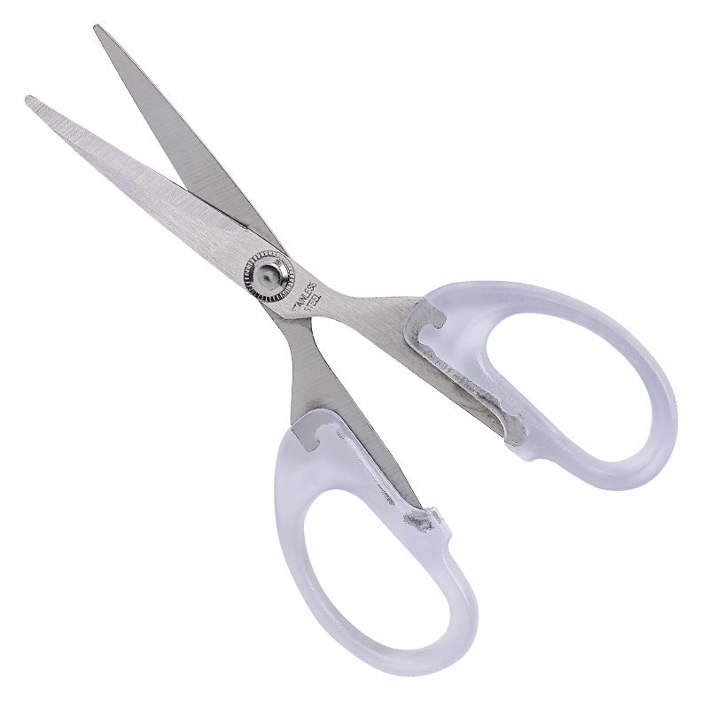 detail view of stainless steel scissor blades clear handle