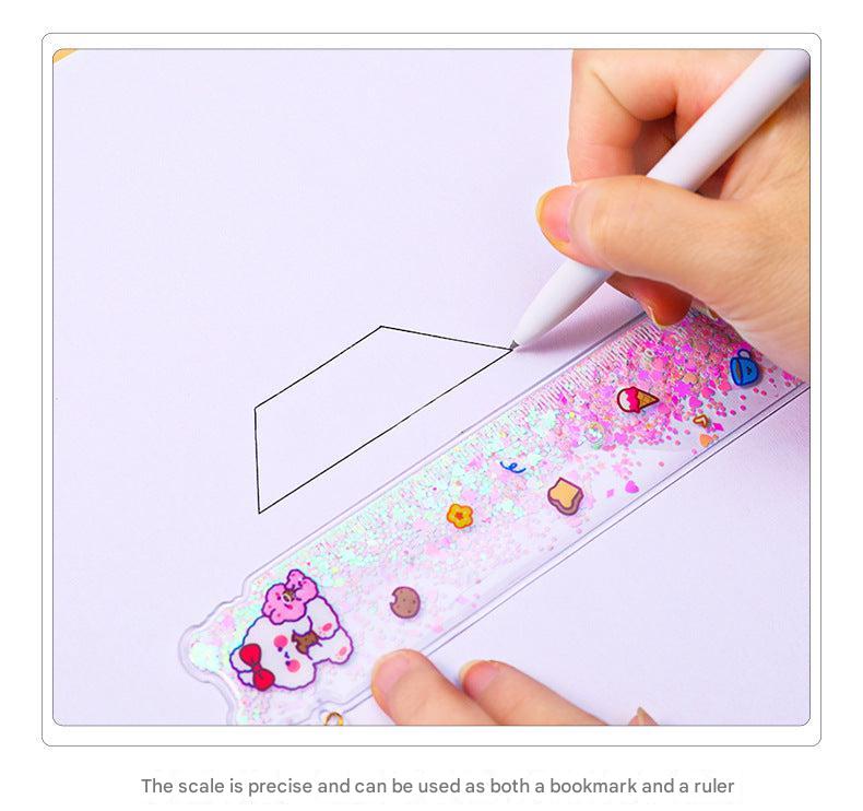 Detailed view of cake bear charm on ruler