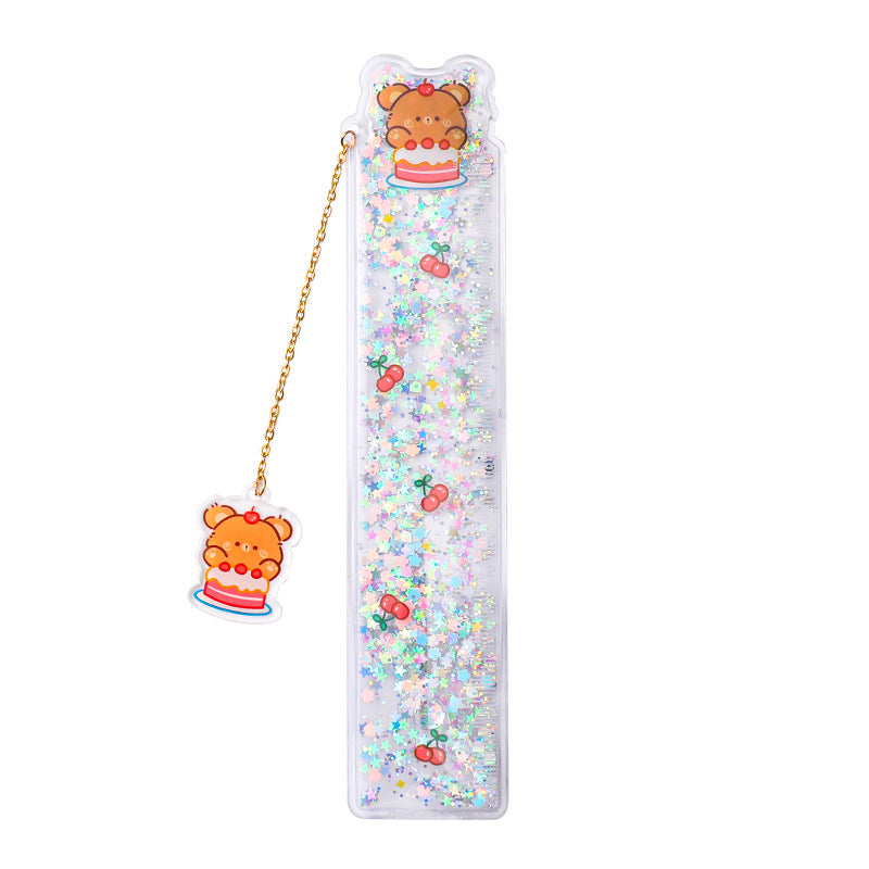 Detailed view of cake bear charm on ruler