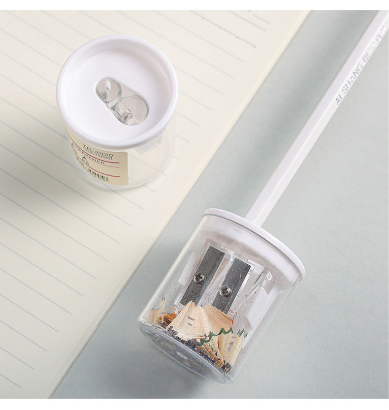 Compact pencil sharpener with coloured pencils