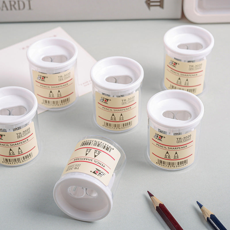 Compact pencil sharpener with coloured pencils