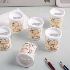 Compact pencil sharpener with coloured pencils
