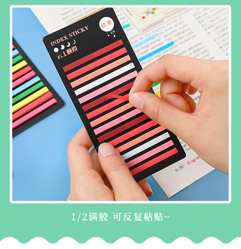Image showcasing sticky notes on textbooks