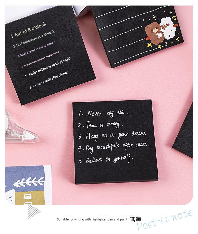 Collage of mixed black sticky notes