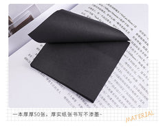 Sleek Black Sticky Notes on a desk