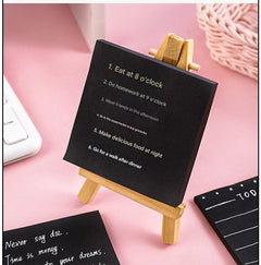 Black sticky notes pack displayed on table