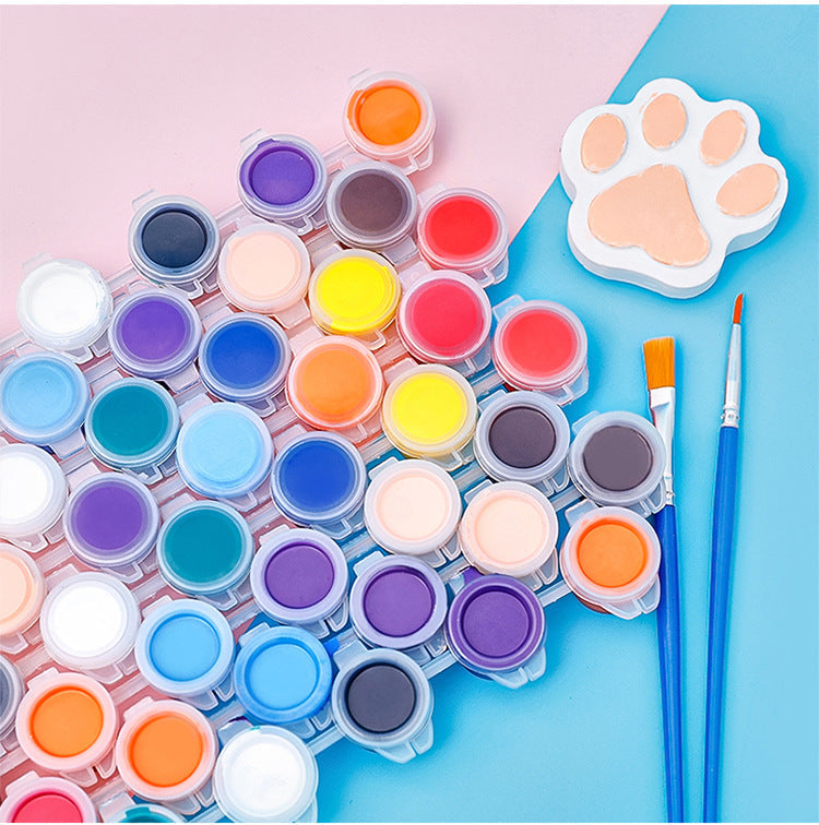Vibrant paints displayed on an artist's palette