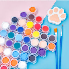 Vibrant paints displayed on an artist's palette