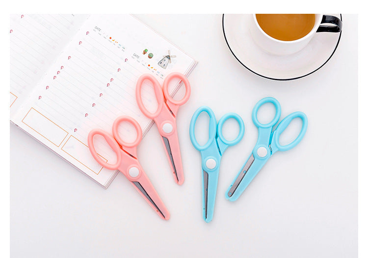 Lightweight pink school scissors displayed