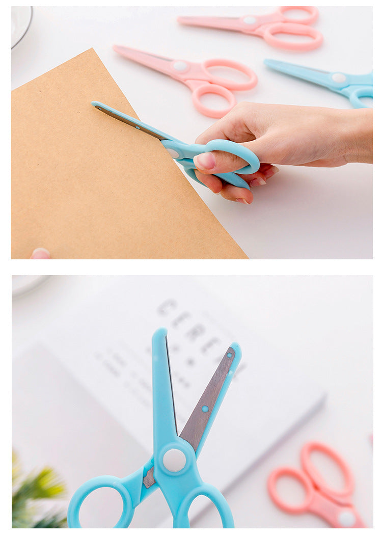 Kids safety scissors in action