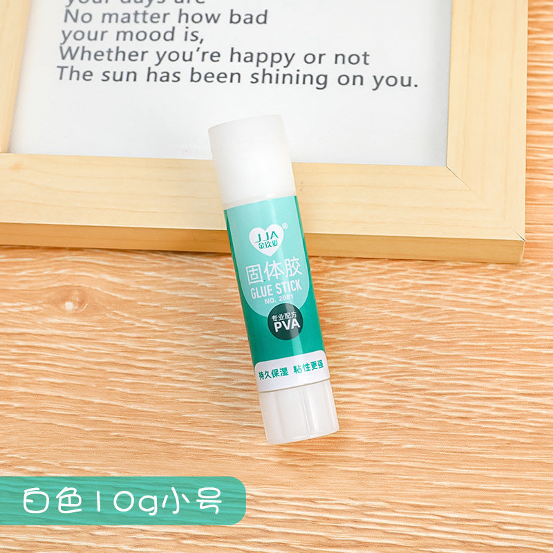 several solid glue sticks in container