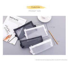 Large black mesh pencil case with various items