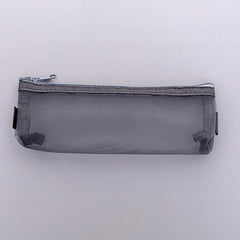 Small white mesh pencil case on table