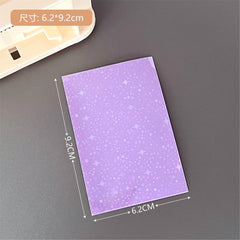 Close-up of macaron photo cards in protective sleeves