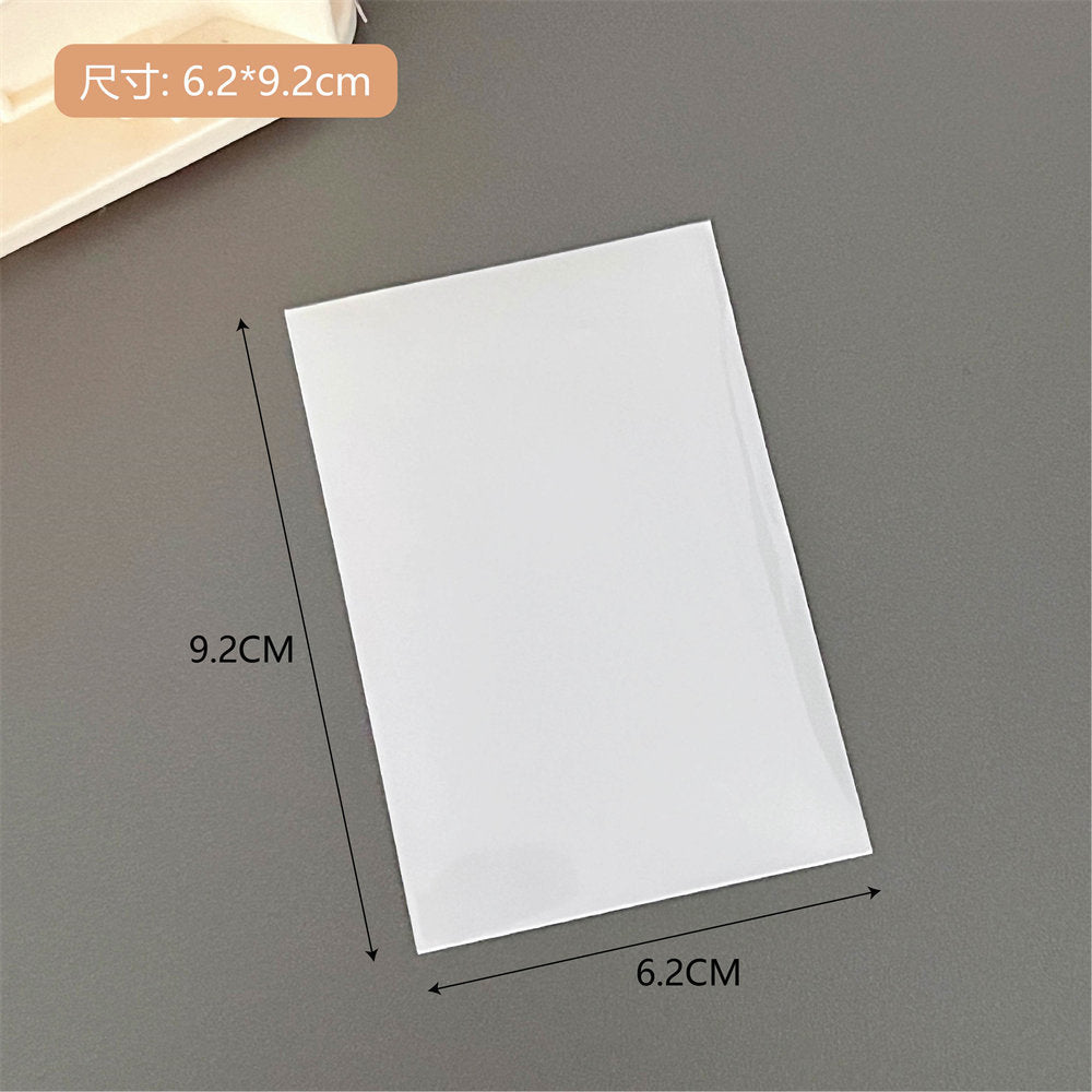 Laser patterned card sleeves for photo organisation