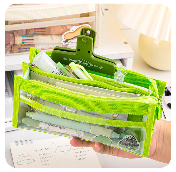 Mesh pencil case with stationery items inside
