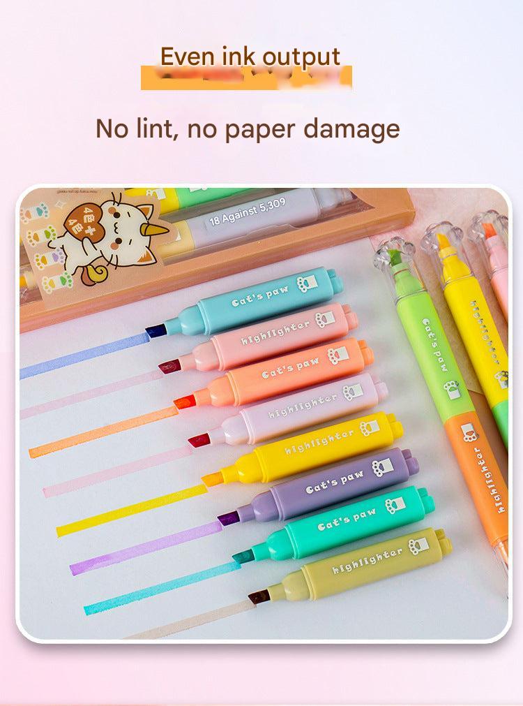 close-up view of cartoon cat paw highlighter tips