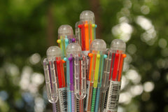 arranged colourful ballpoint pens